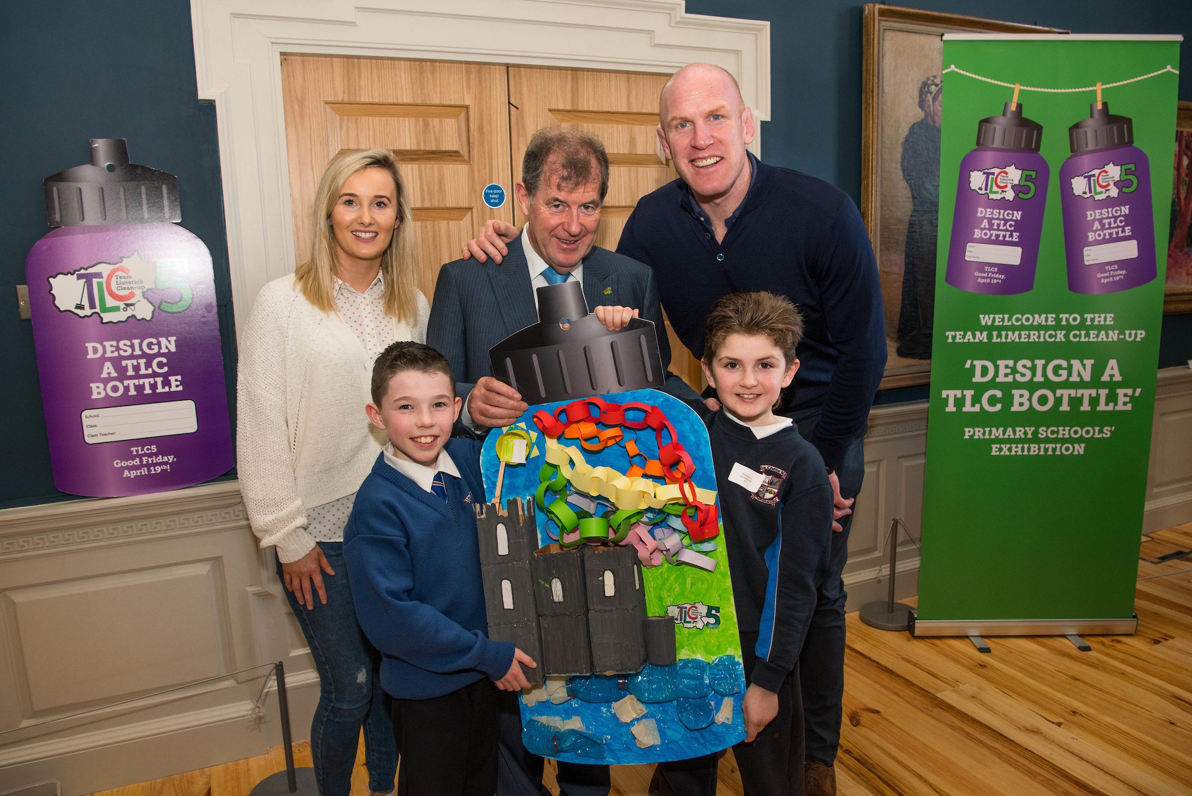 07/03/20193rd place winners of the junior infants-2nd class category are students Travis Wong McNamara, left, and Anthony Casey, from Le Chéile N.S,Roxboro Road, along with teacher Emily Maher, JP McManus and Paul O'Connell at the 'Design a TLC Bottle' prizegiving at the Hunt Museum, Limerick. Over 50 primary schools across the county entered ahead of Team Limerick Clean-Up 5, which will see thousands of volunteers take to the streets of Limerick city and county for Europe's largest one-day clean up. Sponsored by the JP McManus Benevolent Fund, the event has seen over 360 tonnes of litter gathered from the streets since inception in 2015. Over 14,000 volunteers have already signed up for the 2019 event, taking place on Good Friday, 19th April. Photo by Diarmuid Greene