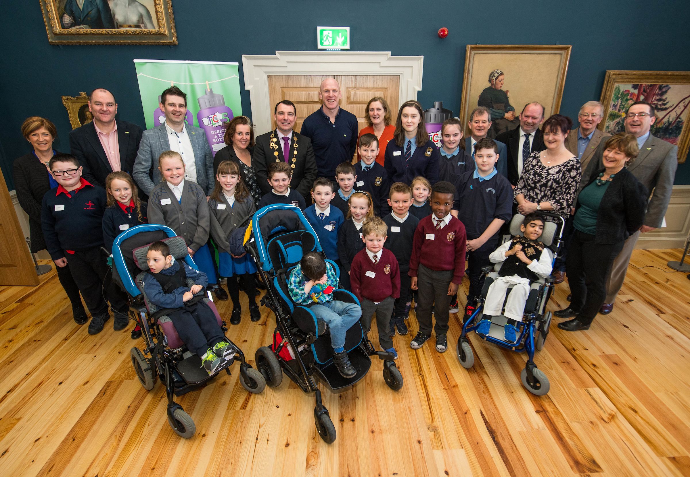 07/03/2019
Prizewinners and representatives along with Joe Cleary from Mr Binman, Sinead McDonnell from Limerick City and County Council, Mayor of Limerick City and County, Cllr James Collins, Paul O'Connell, Helen O'Riordan and JP McManus at the 'Design a TLC Bottle' prizegiving at the Hunt Museum, Limerick. Over 50 primary schools across the county entered ahead of Team Limerick Clean-Up 5, which will see thousands of volunteers take to the streets of Limerick city and county for Europe's largest one-day clean up. Sponsored by the JP McManus Benevolent Fund, the event has seen over 360 tonnes of litter gathered from the streets since inception in 2015. Over 14,000 volunteers have already signed up for the 2019 event, taking place on Good Friday, 19th April. 
Photo by Diarmuid Greene